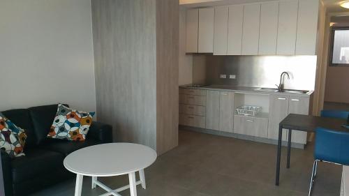 A kitchen or kitchenette at Onslow Apartments