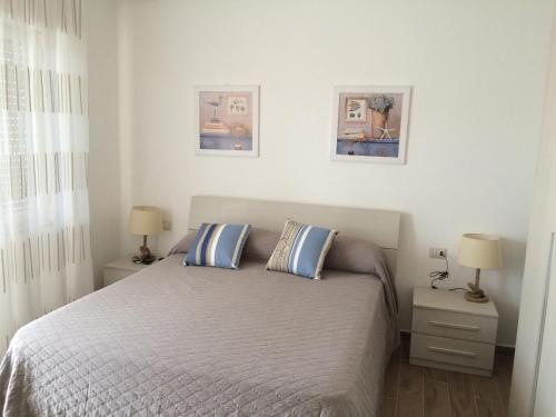 Postel nebo postele na pokoji v ubytování B&B LINEABLU