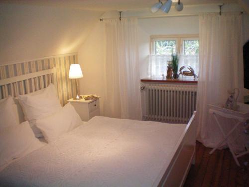 Voodi või voodid majutusasutuse Ferienhaus Klookris 15 toas