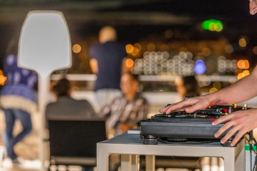 a person is typing on a computer keyboard at Allegro Madeira - Adults Only in Funchal