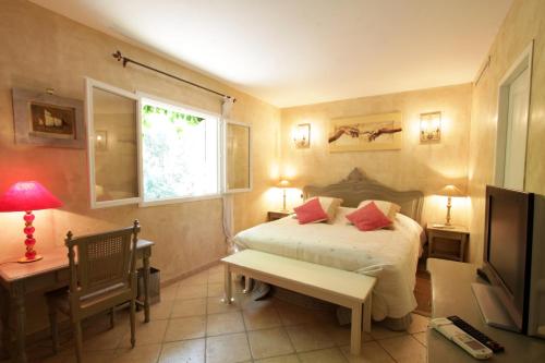 Un pat sau paturi într-o cameră la Villas les Residences de Scaglione
