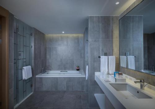 Koupelna v ubytování Sanya Phoenix Airport Hotel