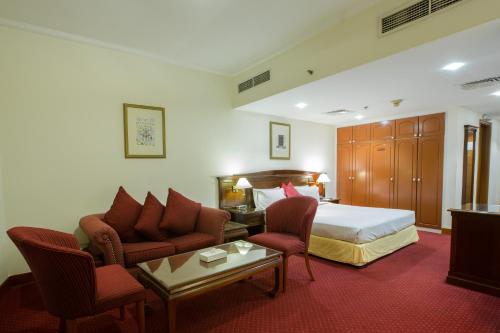Postel nebo postele na pokoji v ubytování York International Hotel