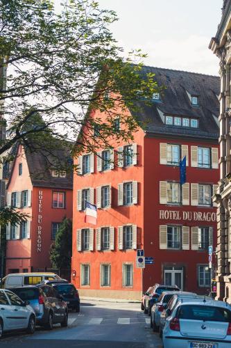 a large red building with the words hotel do raza at Hôtel Du Dragon in Strasbourg