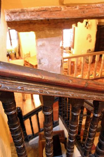 a reflection of a wooden table in a room at Casa Rural Garrido in Ademuz