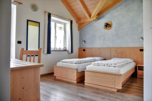 Ein Bett oder Betten in einem Zimmer der Unterkunft B&B 3 Cuori