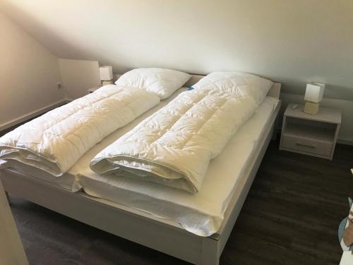 Postel nebo postele na pokoji v ubytování Haus "Kliffruhe"