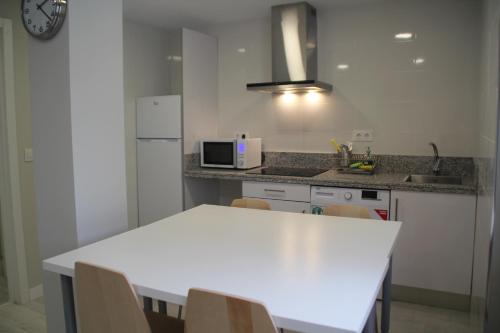 Η κουζίνα ή μικρή κουζίνα στο Apartamentos Logroño Centro