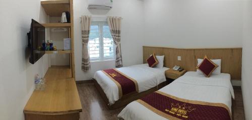 Katil atau katil-katil dalam bilik di King Hotel