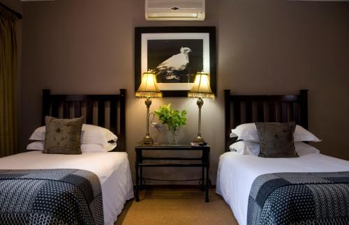 Katil atau katil-katil dalam bilik di The Crown Guest House
