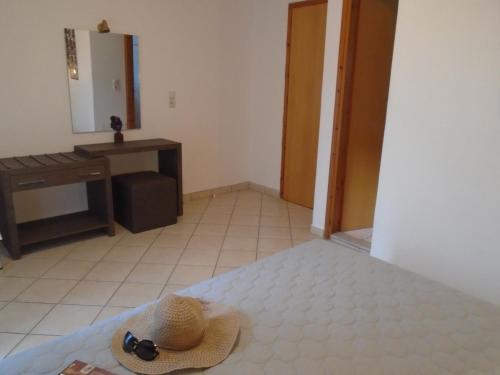 Ένα ή περισσότερα κρεβάτια σε δωμάτιο στο Stella 's Sea Front Apartments