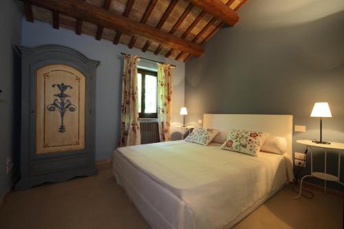 Postel nebo postele na pokoji v ubytování Agriturismo Segnavento