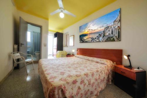 Postel nebo postele na pokoji v ubytování Hotel Piccolo Paradiso