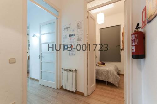 Postel nebo postele na pokoji v ubytování Go-BCN Residence Sagrada Familia