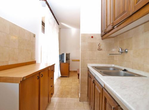 Kuchyňa alebo kuchynka v ubytovaní Apartmensts Nikola 1023