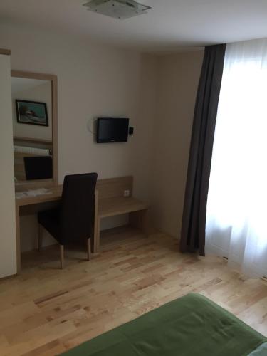 Guest house Vila Žunićにあるテレビまたはエンターテインメントセンター