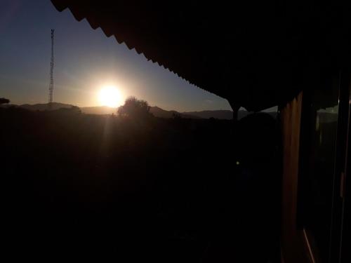 Amanecer o atardecer desde la casa vacacional o alrededores