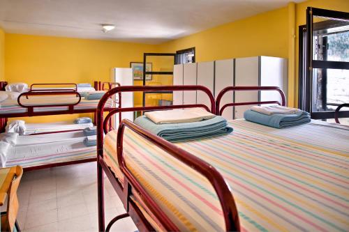 Krevet ili kreveti na kat u jedinici u objektu Albergue Era Garona