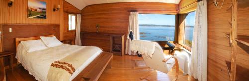 Postel nebo postele na pokoji v ubytování Hotel Faros del Sur
