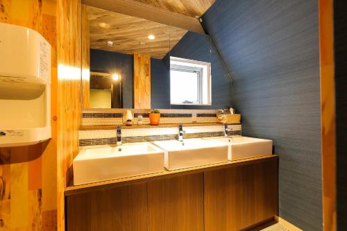 Kylpyhuone majoituspaikassa Kobe Nadeshikoya
