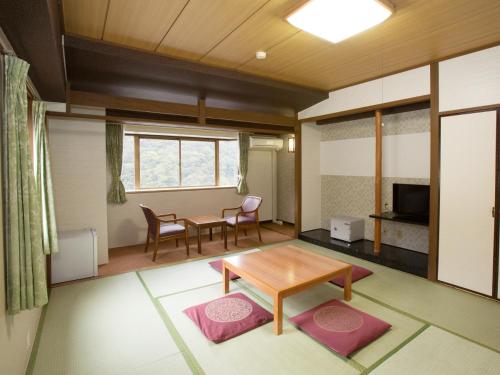Χώρος καθιστικού στο Itoen Hotel Hakone Yumoto