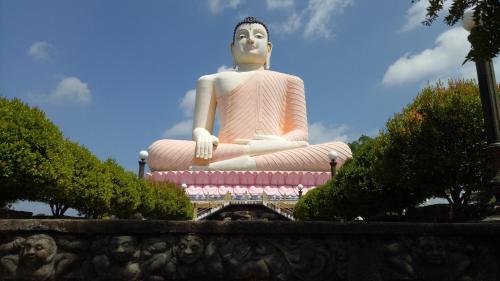 a large statue sitting on top at Mahi Villa in Bentota