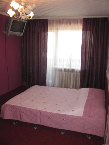 Кровать или кровати в номере Bon Apart Avangard