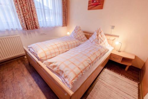 Postel nebo postele na pokoji v ubytování Ferienhaus Grubhof
