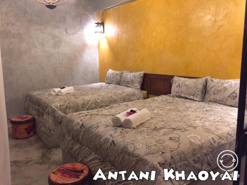 Postel nebo postele na pokoji v ubytování Antani Home @Khaoyai