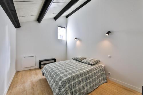 Ένα ή περισσότερα κρεβάτια σε δωμάτιο στο Le loft de Cathy 1