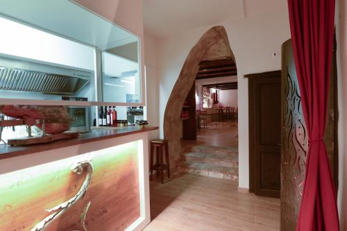 Kuchyň nebo kuchyňský kout v ubytování Borgo Lizori Country House