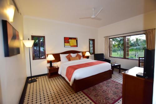 Postel nebo postele na pokoji v ubytování Novotel Goa Dona Sylvia Resort
