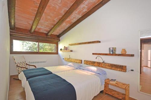 Säng eller sängar i ett rum på Villa Torreon