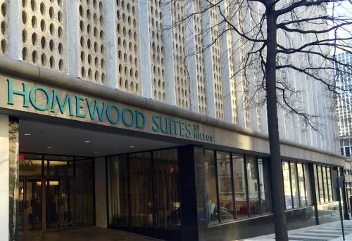 a building with a sign that reads honeywood suites firm at Homewood Suites by Hilton Richmond-Downtown in Richmond