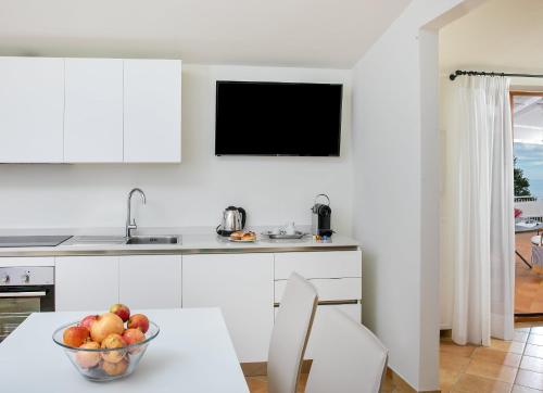 Virtuvė arba virtuvėlė apgyvendinimo įstaigoje Villa Caprile