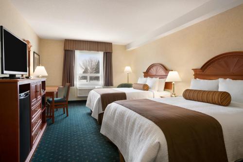 Postel nebo postele na pokoji v ubytování Travelodge by Wyndham Strathmore