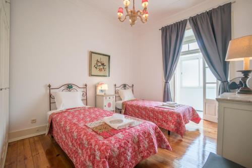 Ένα ή περισσότερα κρεβάτια σε δωμάτιο στο Campo Pequeno 3bdr Apartment