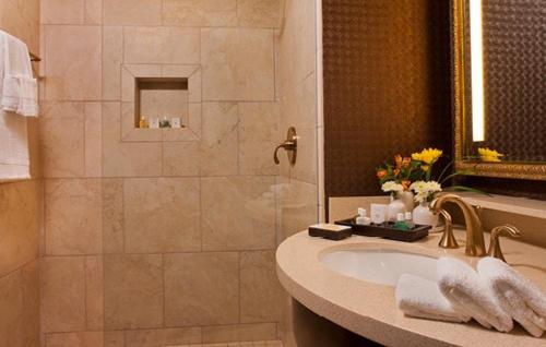 a bathroom with a shower and a sink at Casino del Sol Resort Tucson in Tucson