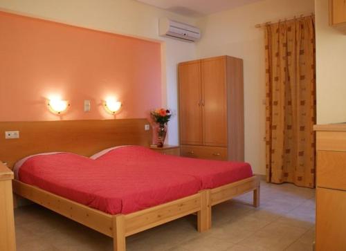 Postel nebo postele na pokoji v ubytování Magic View II Agia Anna