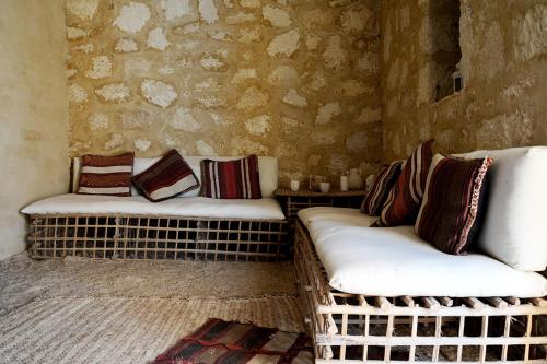 سرير أو أسرّة في غرفة في Siwa Relax Retreat Ecolodge