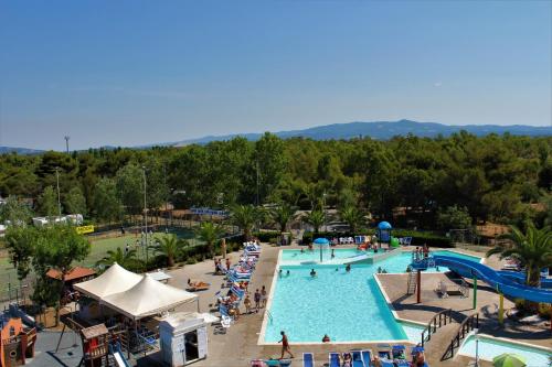 an overhead view of a pool at a resort at Camping Village Baia del Marinaio in Vada