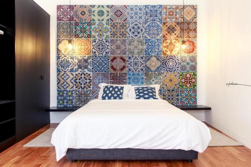 Postel nebo postele na pokoji v ubytování Orpheus - Miguel Torga - UNESCO Heritage