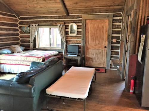 Postel nebo postele na pokoji v ubytování Creek Cabin