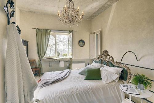 A bed or beds in a room at Villa Torrecorta