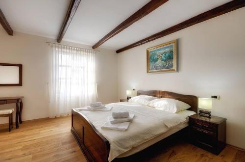 Postel nebo postele na pokoji v ubytování Villa Silvano
