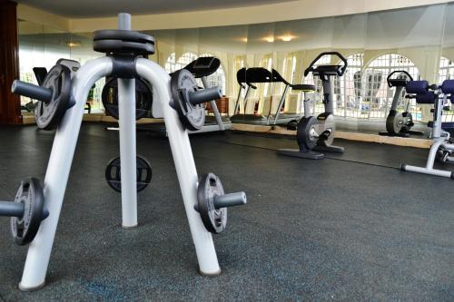 a row of exercise bikes in a gym at Muthu Sovereign Suites & Spa, Limuru Road, Nairobi in Limuru