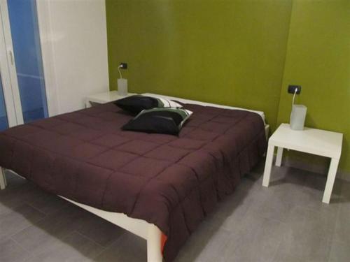 Ein Bett oder Betten in einem Zimmer der Unterkunft Residenza Roggiolo