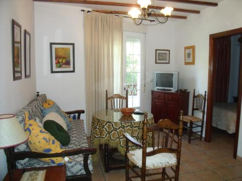 TV a/nebo společenská místnost v ubytování Apartamentos Rurales Parque