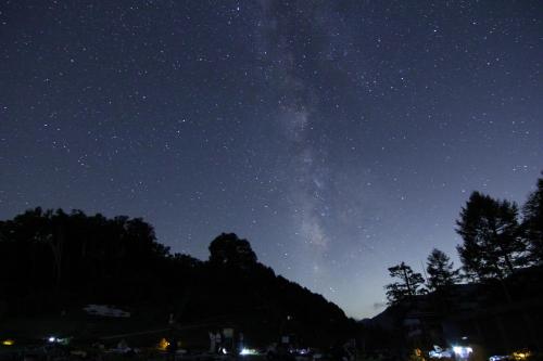 a starry night with the milky way in the sky at Hirugami Grand Hotel Tenshin in Achi