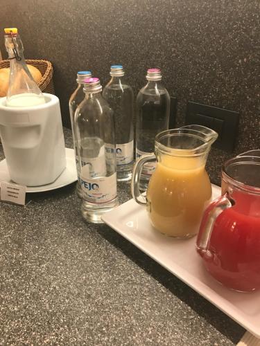 a group of bottles of juice on a counter at Agritur Maso Piasina in Tesero